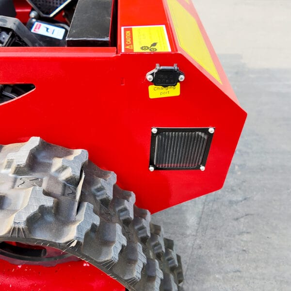 Small tracked lawn mower