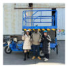 The electric tricycle lift can raise the vehicle to a height of four meters.